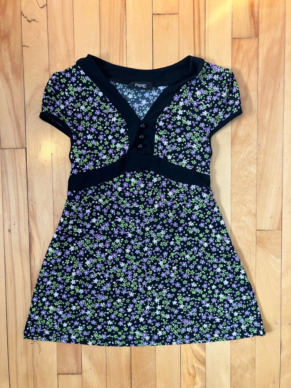 Black Floral Cap-Sleeve top with Green, White & Purple Blossoms
